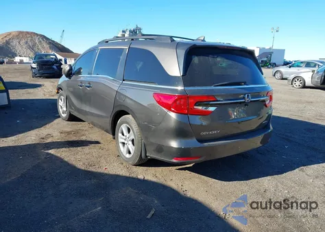 2021 Honda Odyssey Touring z USA, uszkodzony, nr VIN 5FNRL6H81MB039764